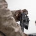 U.S. Marines clean and inspect M4 carbines