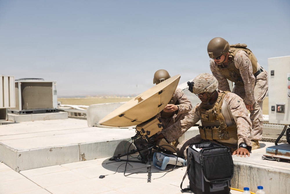 U.S. Marines perform operations check on Tampa Microwave Satellite