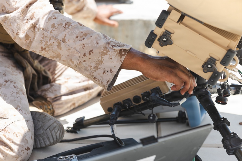 U.S. Marines perform operations check on Tampa Microwave Satellite