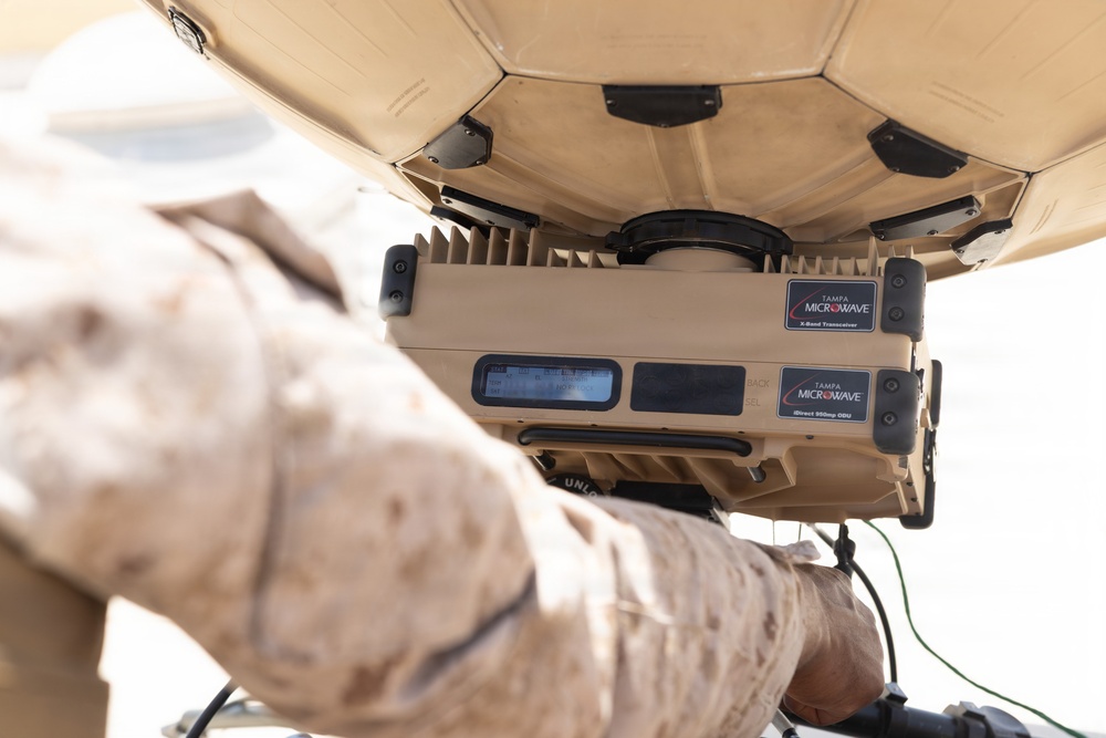 U.S. Marines perform operations check on Tampa Microwave Satellite