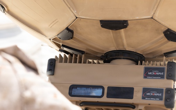 U.S. Marines perform operations check on Tampa Microwave Satellite
