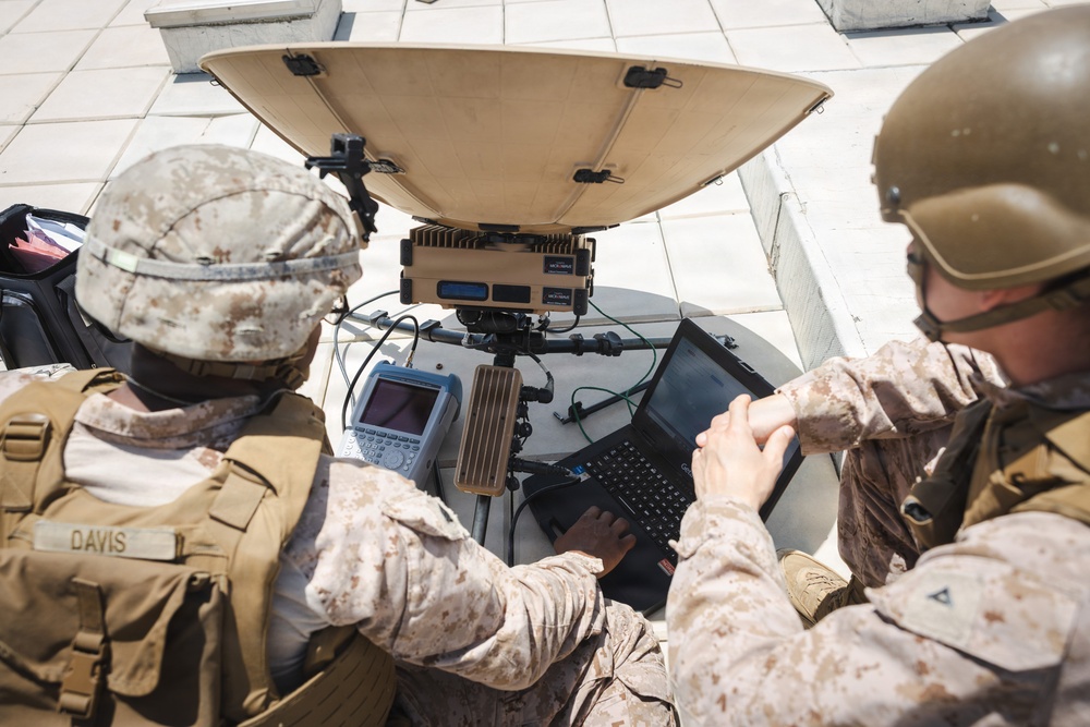 U.S. Marines perform operations check on Tampa Microwave Satellite