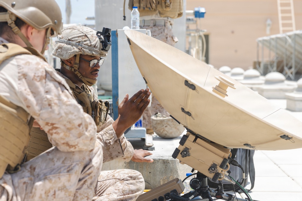 U.S. Marines perform operations check on Tampa Microwave Satellite