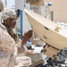 U.S. Marines perform operations check on Tampa Microwave Satellite