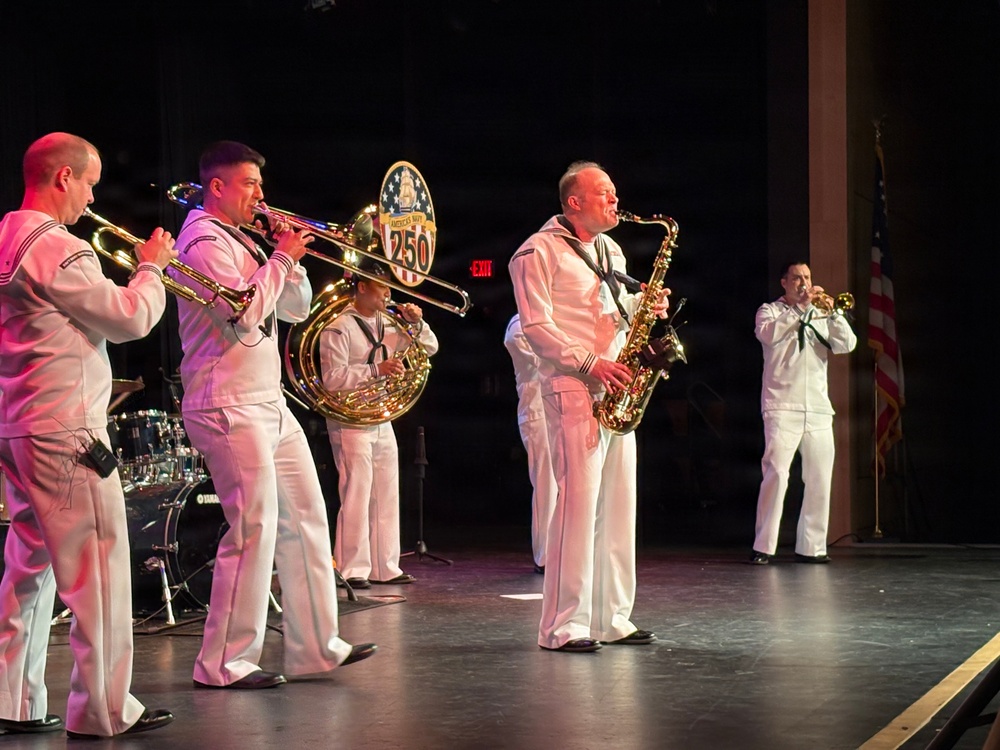Navy Band Northeast’s Jack Tar Brass Band performed a concert celebrating military music for the students and staff of Rogers Middle School in Rockland, Massachusetts.