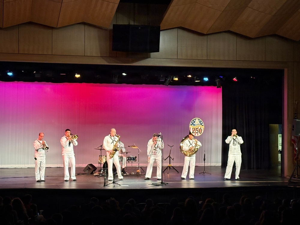 Navy Band Northeast’s Jack Tar Brass Band performed a concert celebrating military music for the students and staff of Rogers Middle School in Rockland, Massachusetts.