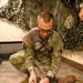 A Soldier with the 184th Expeditionary Sustainment Command, MSARNG, conducts Combat Life Saver (CLS) Training during Annual Training