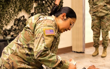 A Soldier with the 184th Expeditionary Sustainment Command, MSARNG, conducts Combat Life Saver (CLS) Training during Annual Training