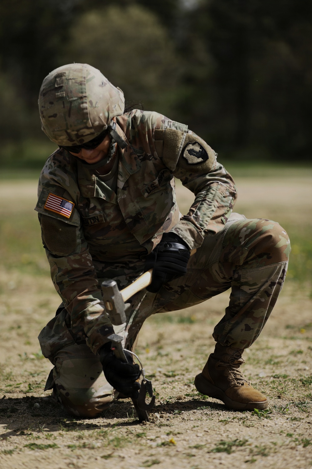 U.S. Army Soldier with the 335th Signal Command Sets Up Communication Systems for the Best Squad Competition