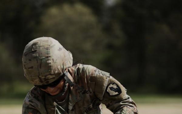 U.S. Army Soldier with the 335th Signal Command Sets Up Communication Systems for the Best Squad Competition