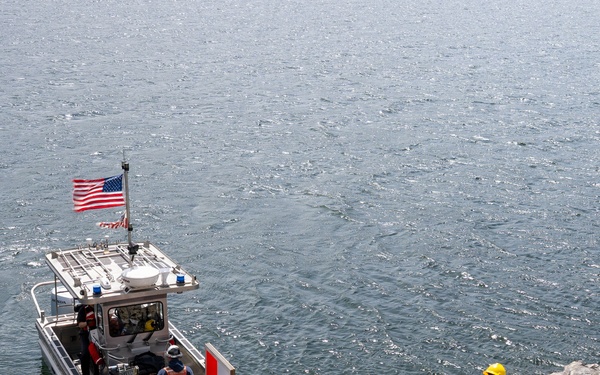 U.S. Coast Guard Aids to Navigation crew members service shore aids and buoys on Lake Roosevelt in Washington.