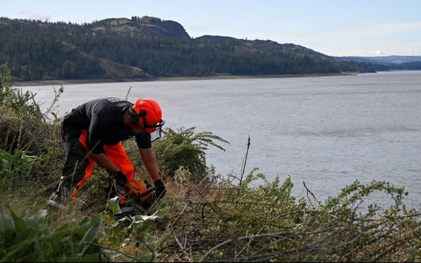 U.S. Coast Guard Aids to Navigation crew members service shore aids and buoys on Lake Roosevelt in Washington.