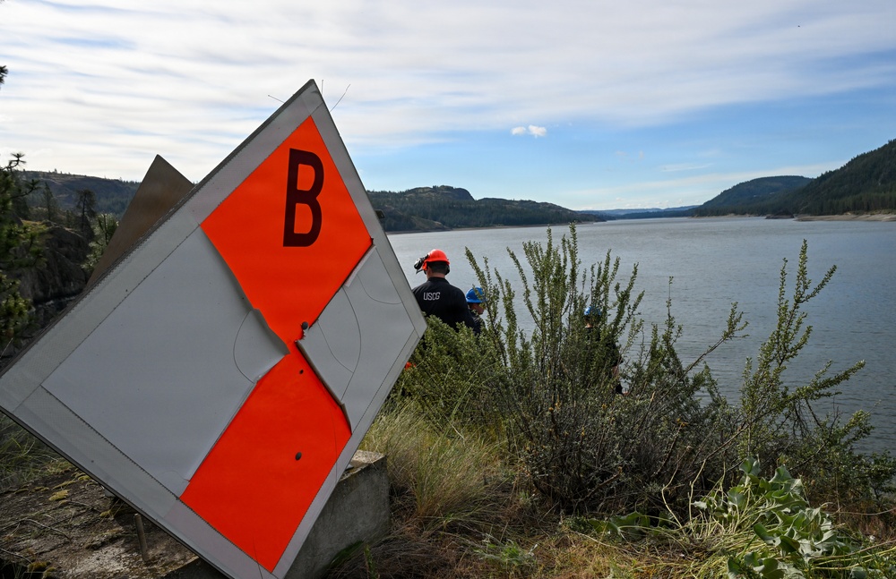 U.S. Coast Guard Aids to Navigation crew members service shore aids and buoys on Lake Roosevelt in Washington.