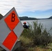 U.S. Coast Guard Aids to Navigation crew members service shore aids and buoys on Lake Roosevelt in Washington.