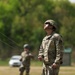 U.S. Army Soldier with the 335th Signal Command Sets Up Antennas for the Best Squad Competition