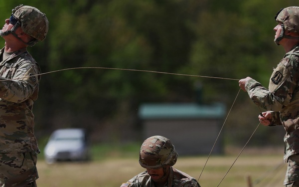 U.S. Army Soldiers with the 335th Signal Command Set Up Antennas for the Best Squad Competition