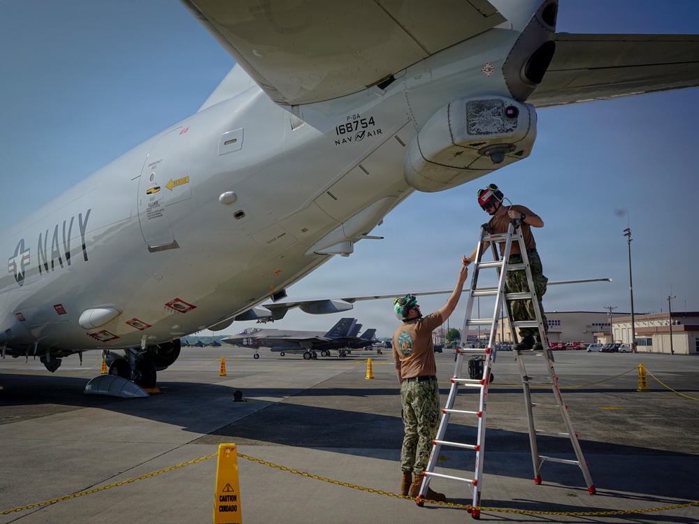 VP-26 Tridents Conduct Routine Inspection of a P-8A Poseidon