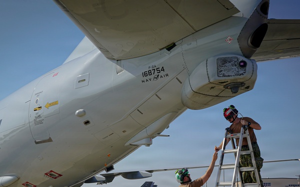 VP-26 Tridents Conduct Routine Inspection of a P-8A Poseidon