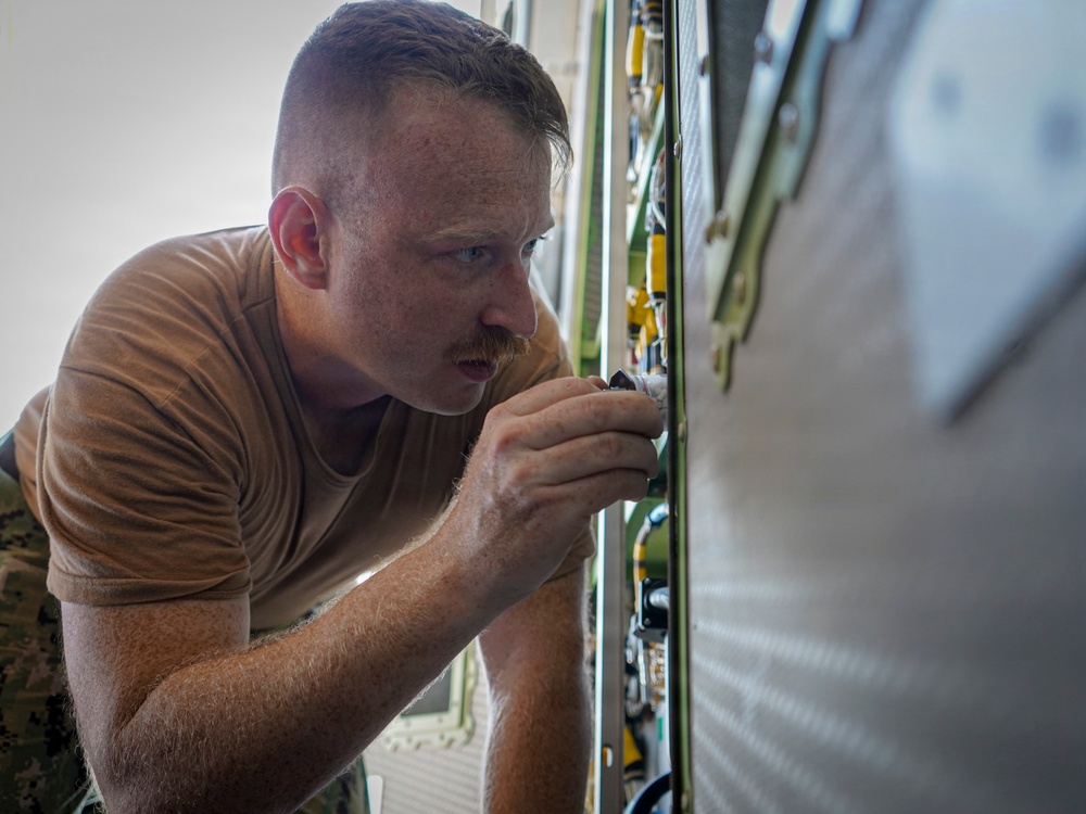 VP-26 Tridents Conduct Routine Inspection of a P-8A Poseidon