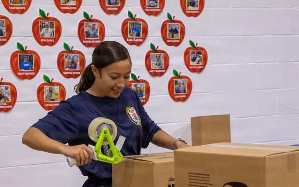 Sailors volunteer at Central Pennsylvania Food Bank during Harrisburg Navy Week