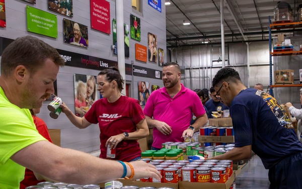 Sailors volunteer at Central Pennsylvania Food Bank during Harrisburg Navy Week