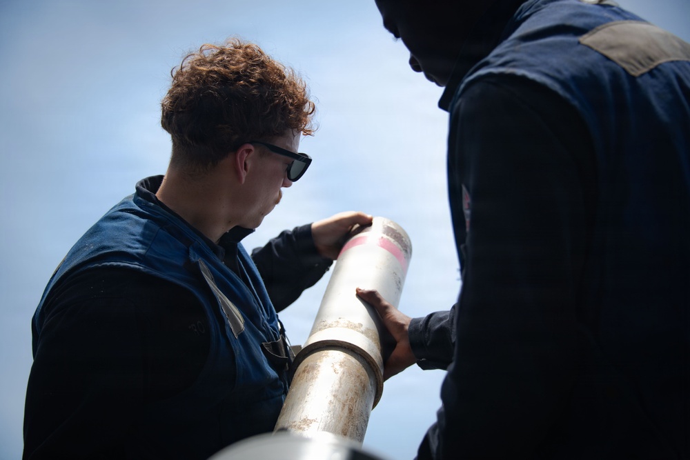 Boxer Sailors Conduct Chaff Removal and Stowage