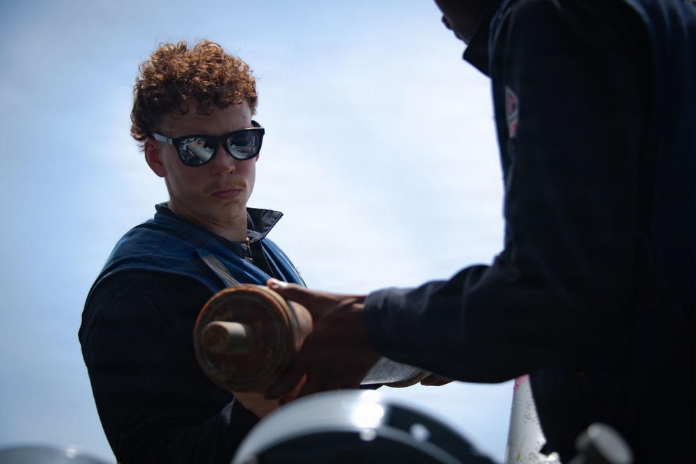 Boxer Sailors Conduct Chaff Removal and Stowage