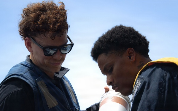 Boxer Sailors Conduct Chaff Removal and Stowage