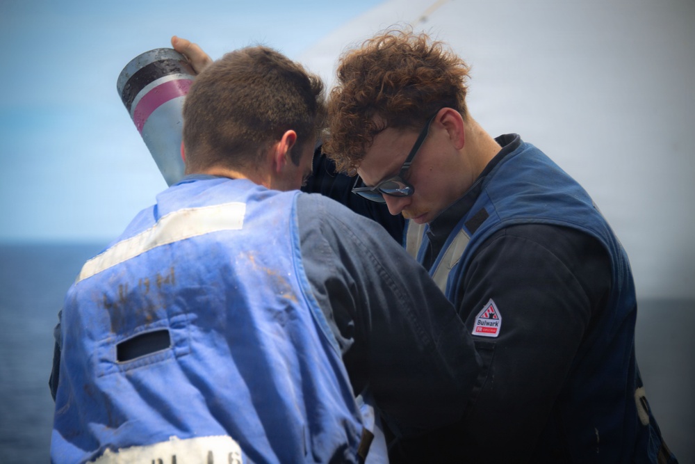 Boxer Sailors Conduct Chaff Removal and Stowage