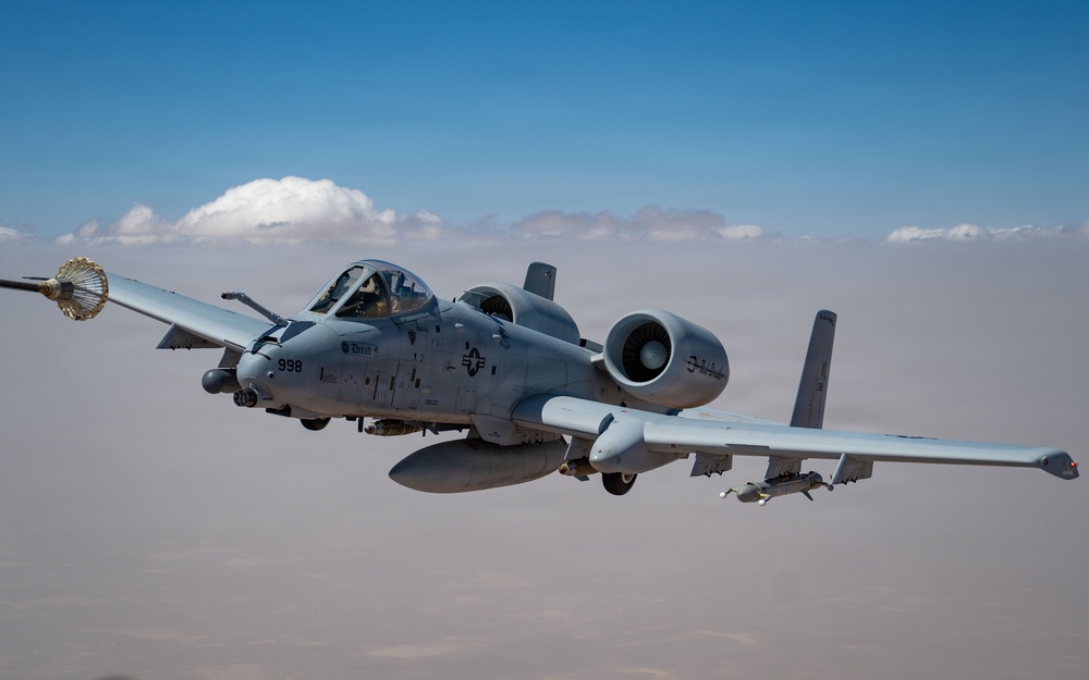 HC-130 crew refuels A-10s