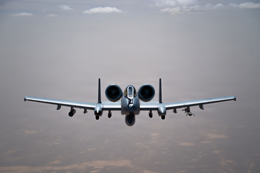 HC-130 crew refuels A-10s
