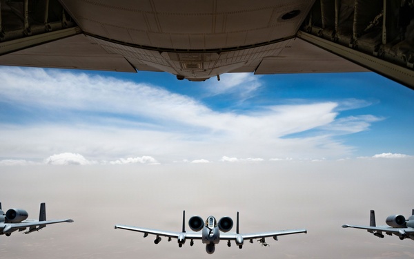 HC-130 crew refuels A-10s