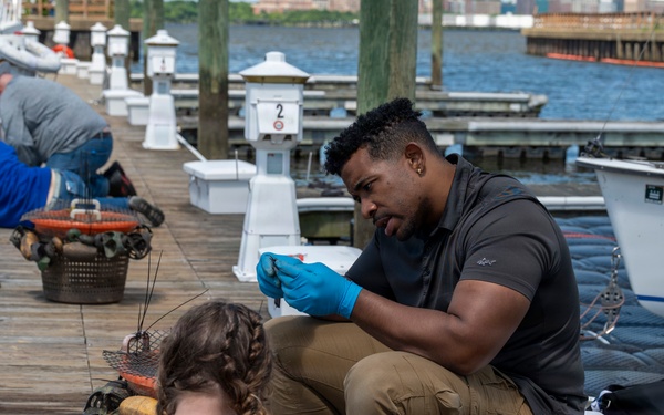 JBAB’s environmental team executes a freshwater mussel deployment in Potomac