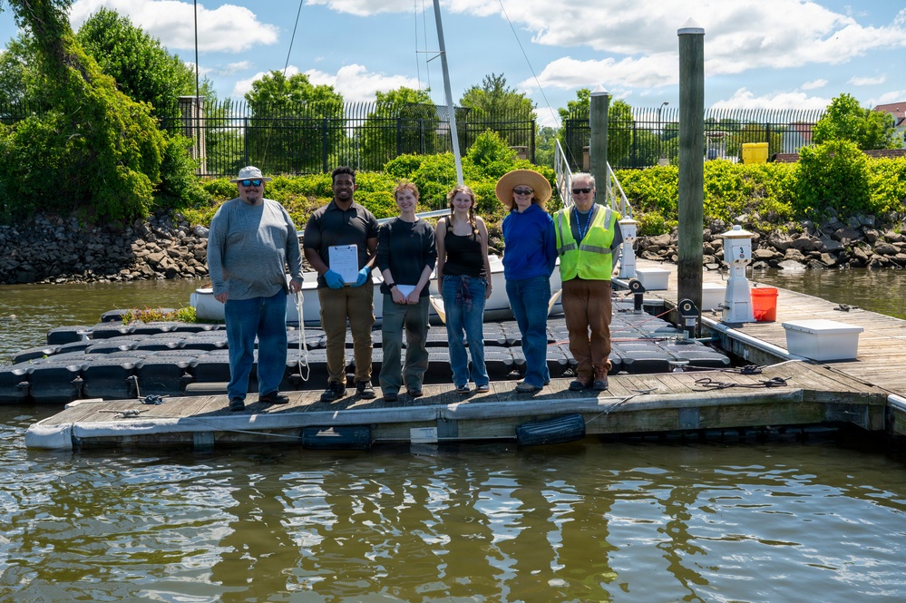 JBAB’s environmental team executes a freshwater mussel deployment in Potomac