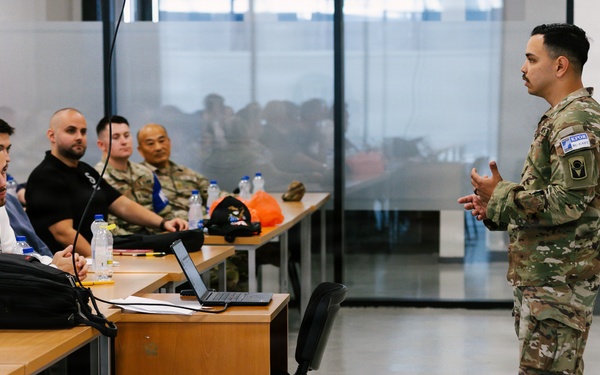 KFOR security and law Soldiers educate local students during community safety event