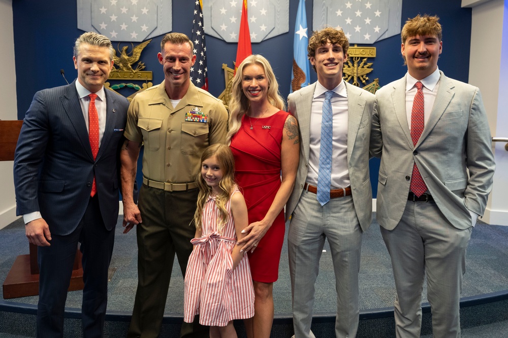 SW Reenlists USMC SSG Joey Jones