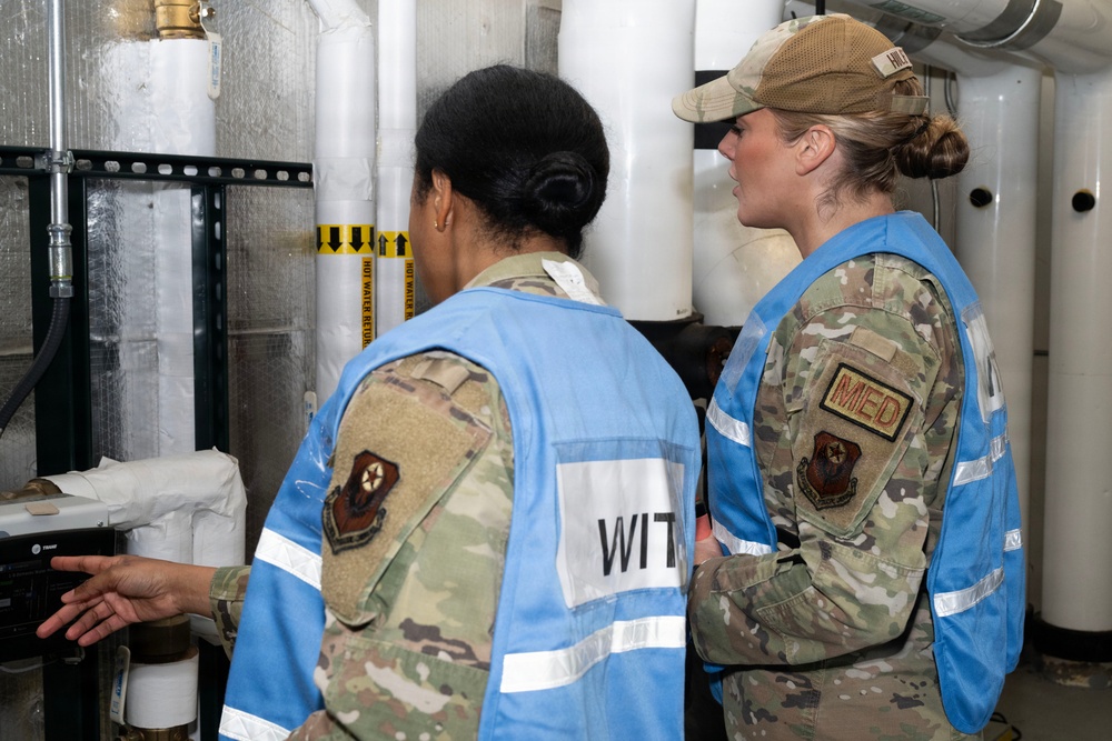 Military medical professionals operate without power