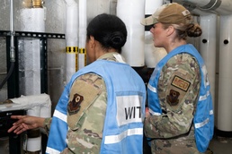 Military medical professionals operate without power