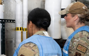 Military medical professionals operate without power