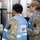 Military medical professionals operate without power