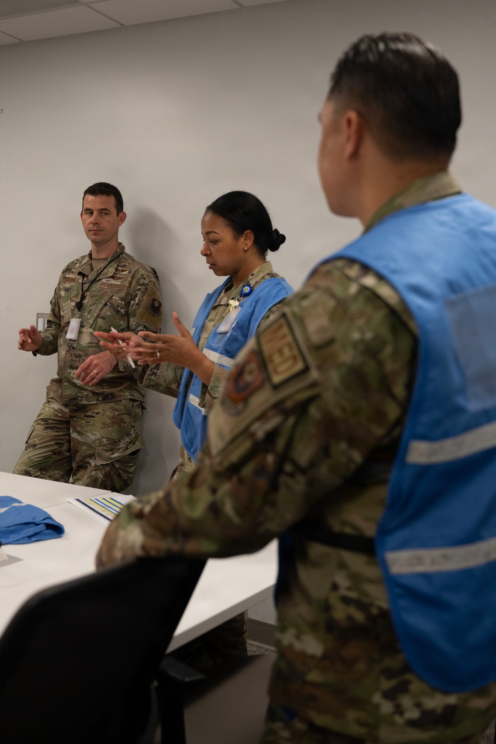 Military medical professionals operate without power