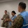 Military medical professionals operate without power