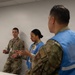 Military medical professionals operate without power
