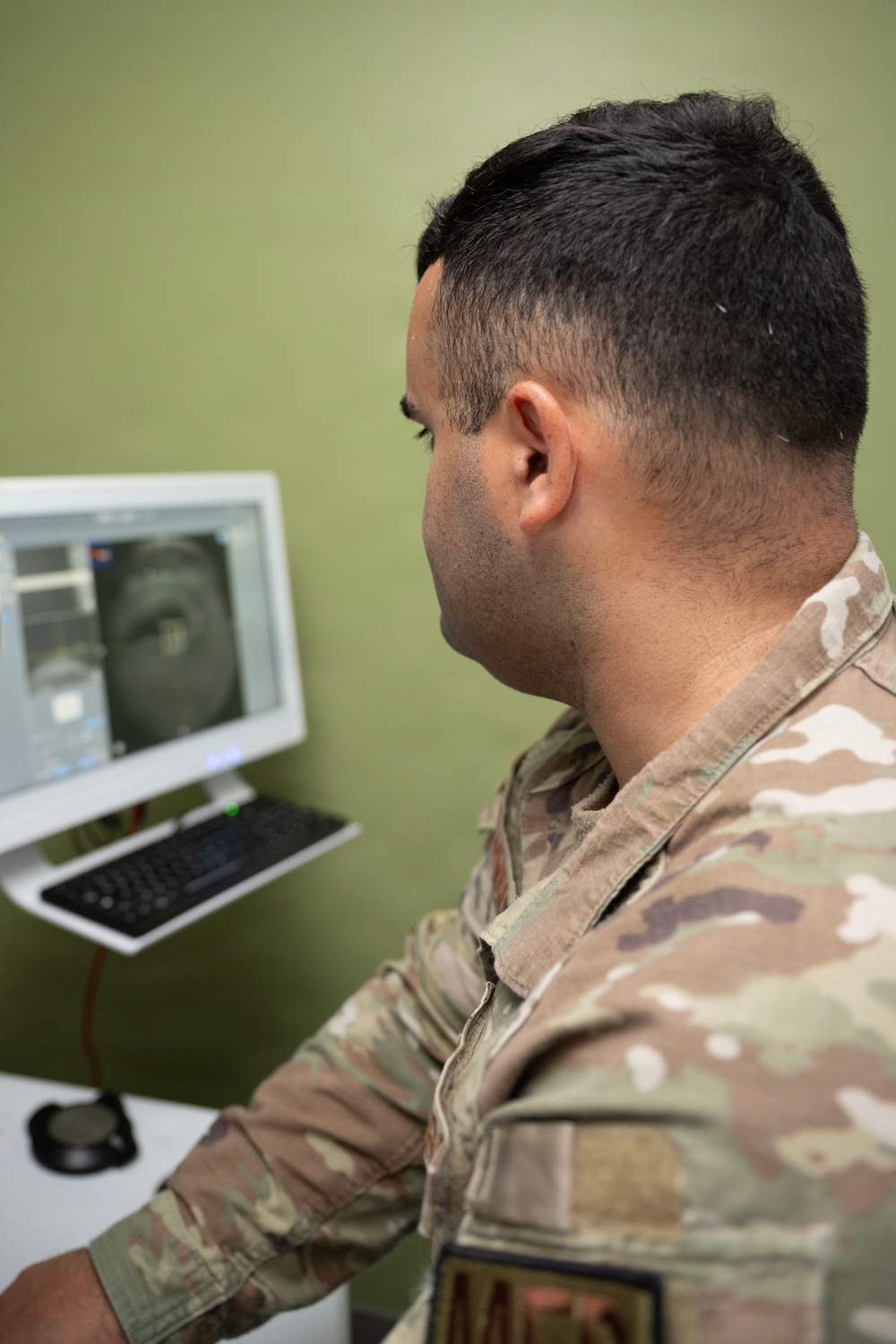 Military medical professionals operate without power