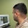 Military medical professionals operate without power