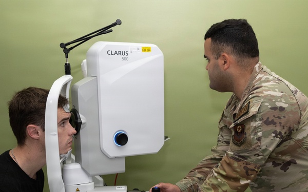 Military medical professionals operate without power