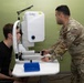 Military medical professionals operate without power