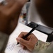 Military medical professionals operate without power