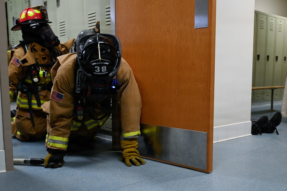 Firefighters with the Pease Fire Department and the 157th Civil Engineering Squadron in Search &amp; Rescue Exercise