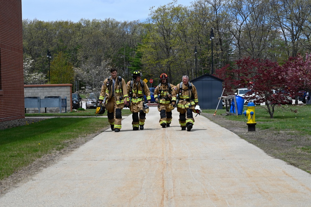 Firefighters with the Pease Fire Department and the 157th Civil Engineering Squadron in Search &amp; Rescue Exercise